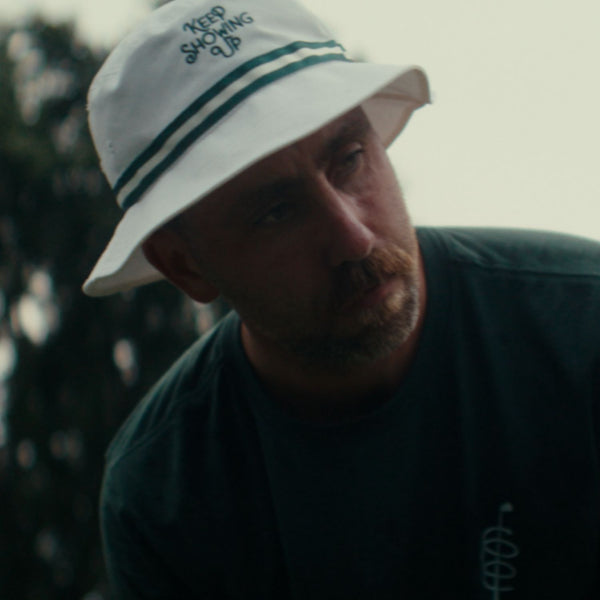 KEEP SHOWING UP BUCKET HAT