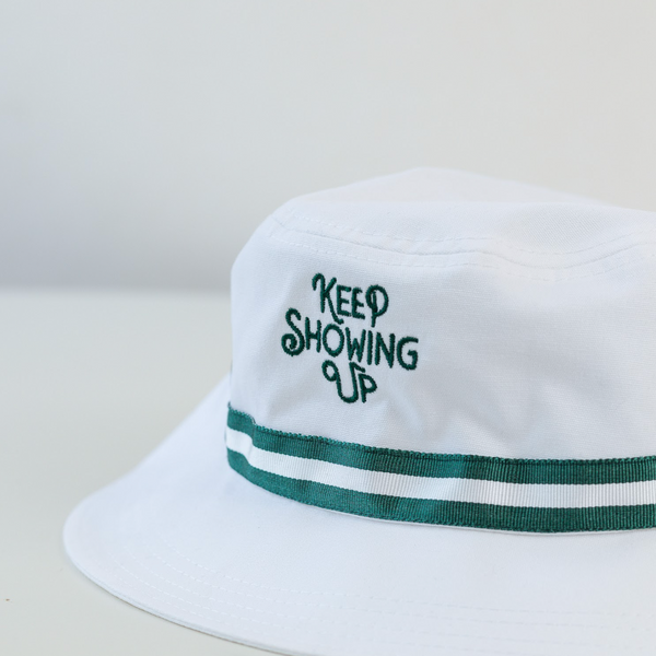 KEEP SHOWING UP BUCKET HAT