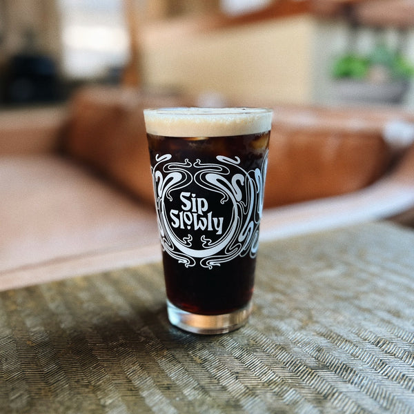 SIP SLOWLY PINT GLASS