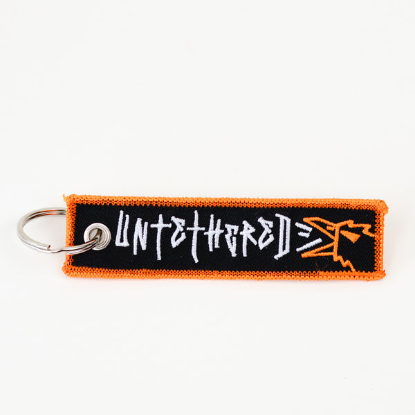 UNTETHERED EMBROIDERED KEYCHAIN