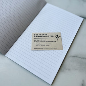 Flora & Frog Journal on table